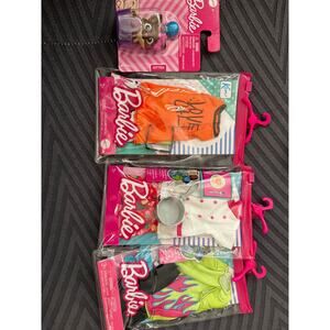 Barbie 4 pack 2 Ken Clothes, 1 Barbie and Pet